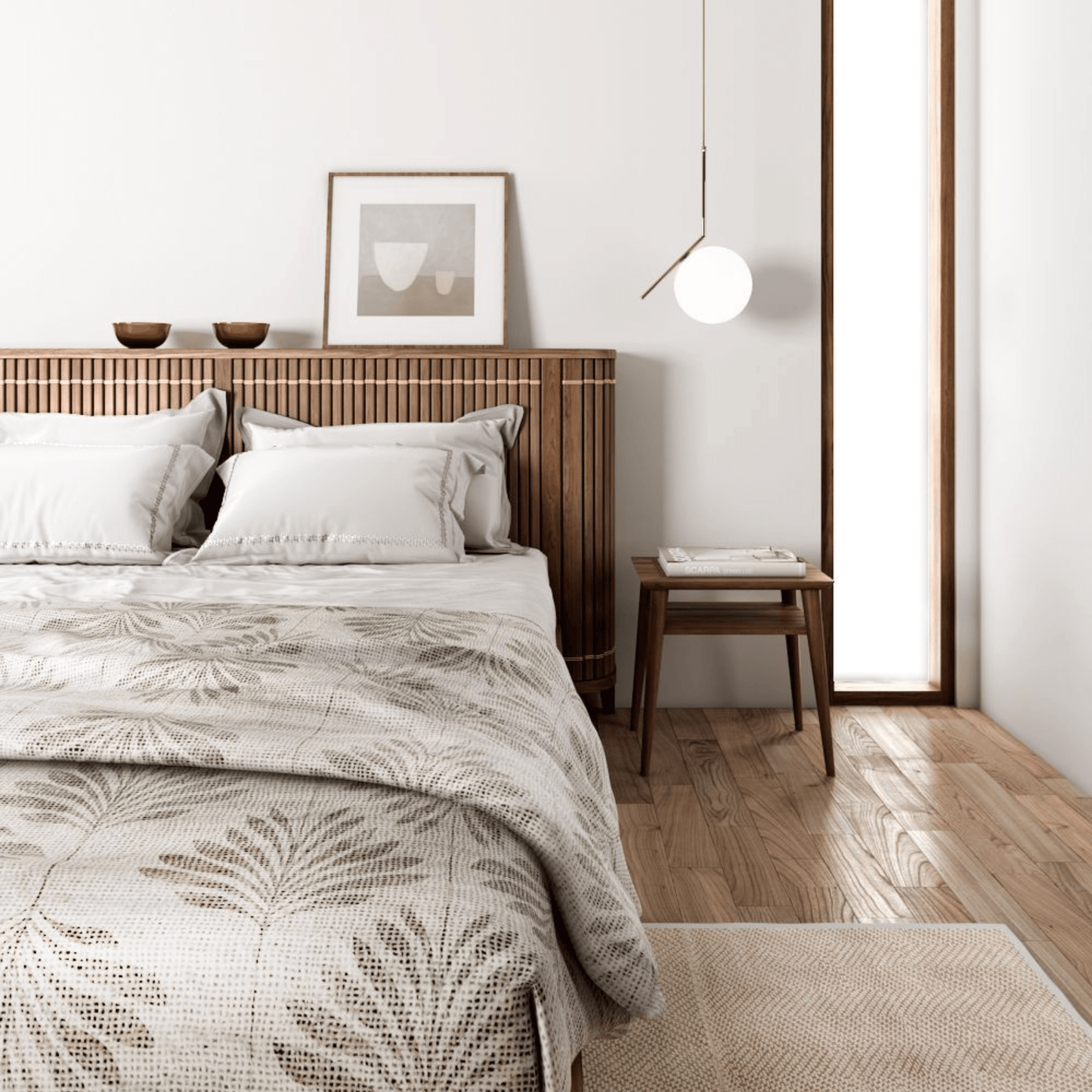 Bedroom interior with wood headboard and patterned bedding.