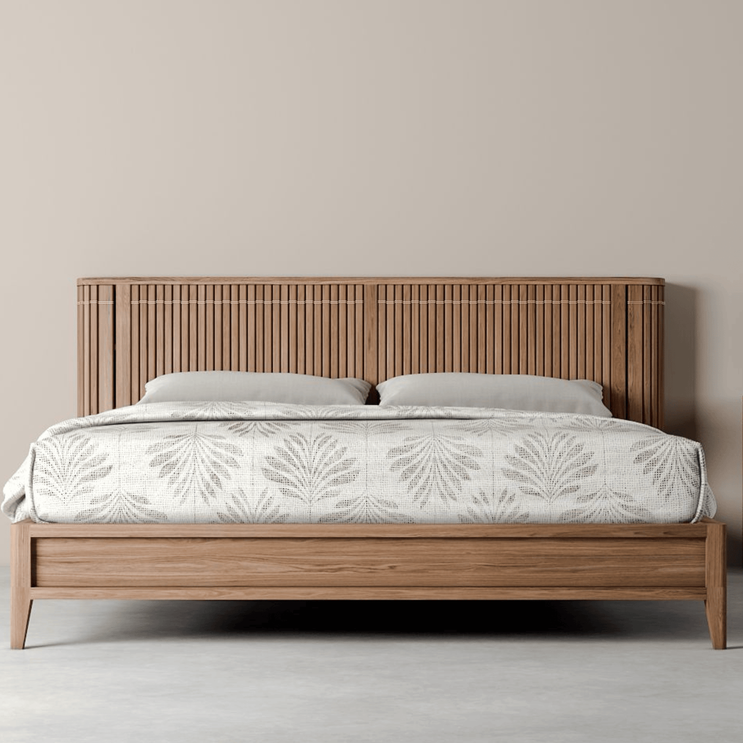 Wooden bed frame with patterned bedding.