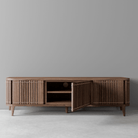 Wooden cabinet with open door.