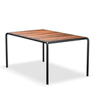 Table with wood top and black legs.