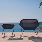 5064LS_3 outdoor chair and side table overlooking the ocean.