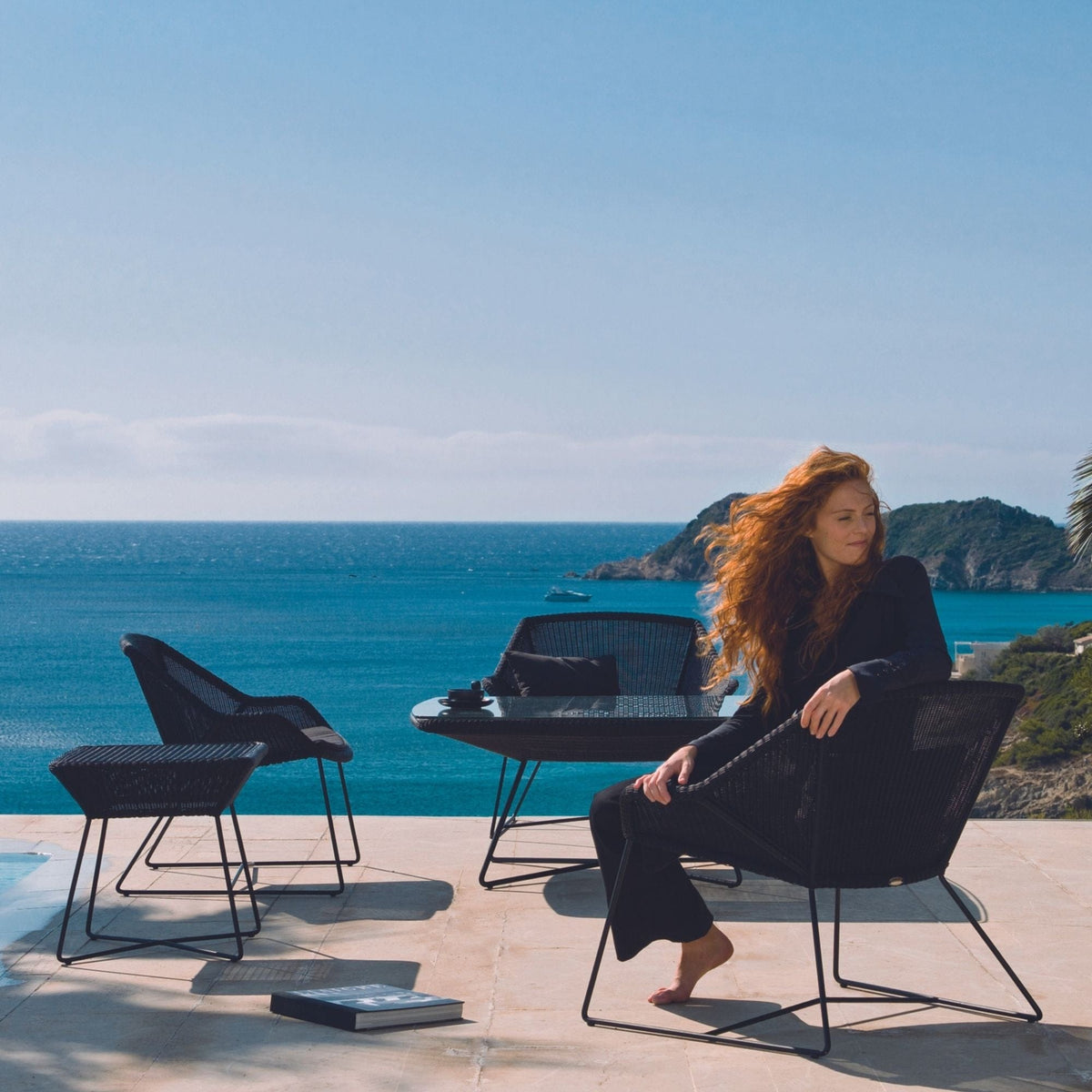 5064LS_5 Outdoor seating set with woman overlooking ocean