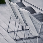 5467LI_3 wicker chairs on deck