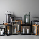 Assorted lanterns with lit candles