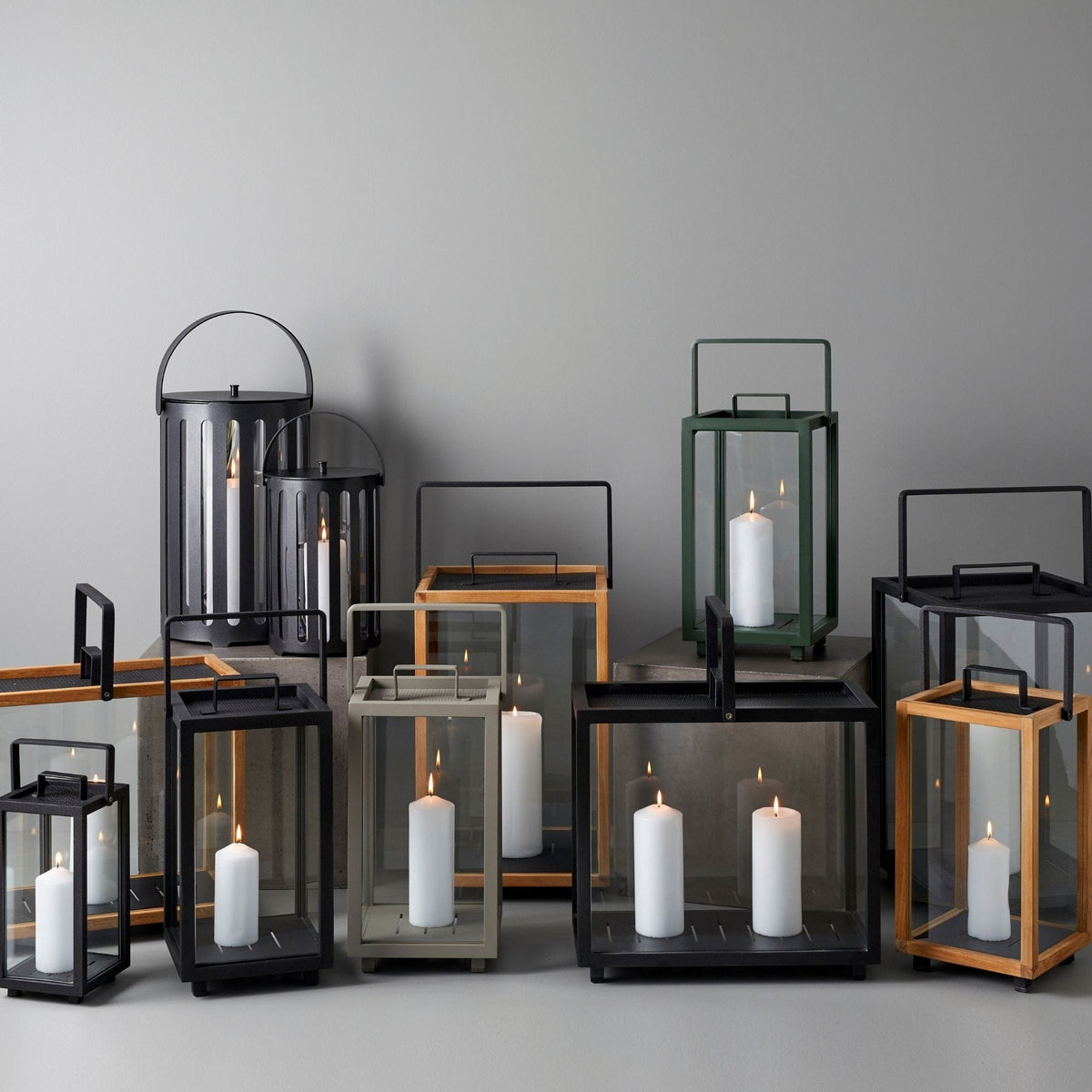 Assorted lanterns with lit candles