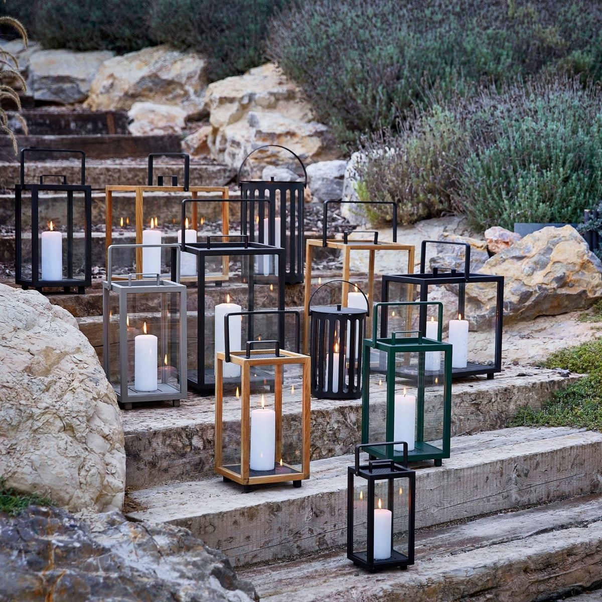 Outdoor candle lanterns on stone steps