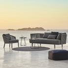 7443ROGAITG_7 outdoor furniture set on patio with ocean view