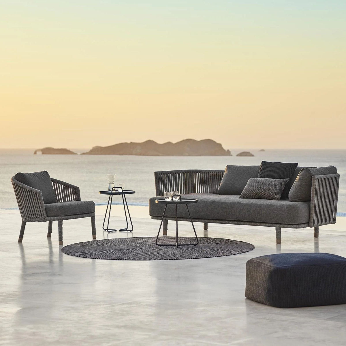 7443ROGAITG_7 outdoor furniture set on patio with ocean view