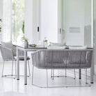Outdoor dining set with grey rope chairs