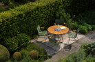 Outdoor table and chairs in a garden setting