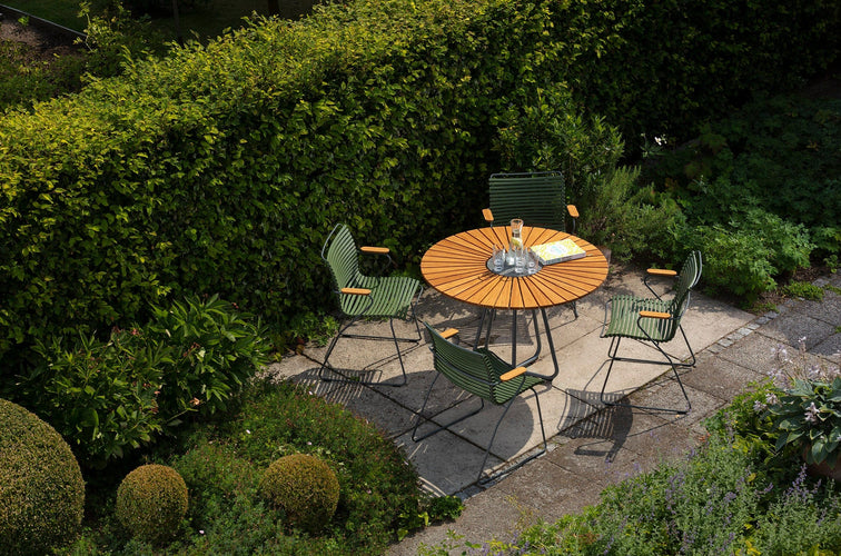 Outdoor table and chairs in a garden setting
