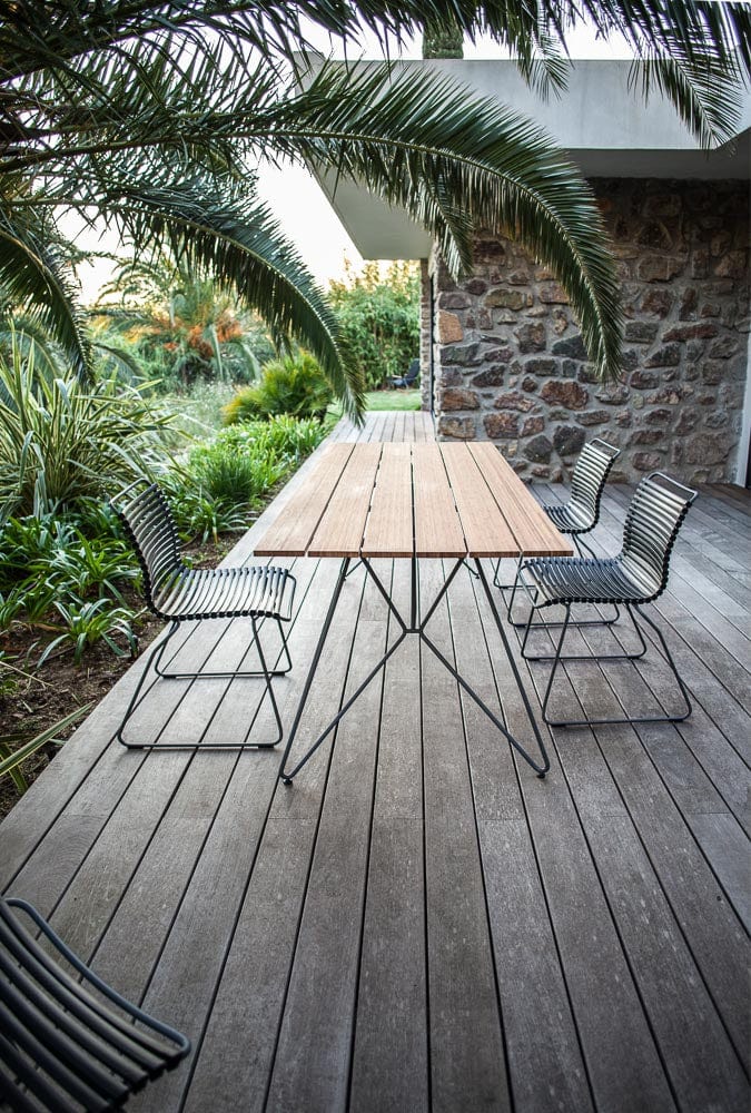 Black dining set sketch on wooden deck