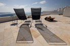 CLICK Lounge black chairs on HOUE 1976 terrace