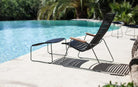 CLICK Lounge chair with footrest by HOUE