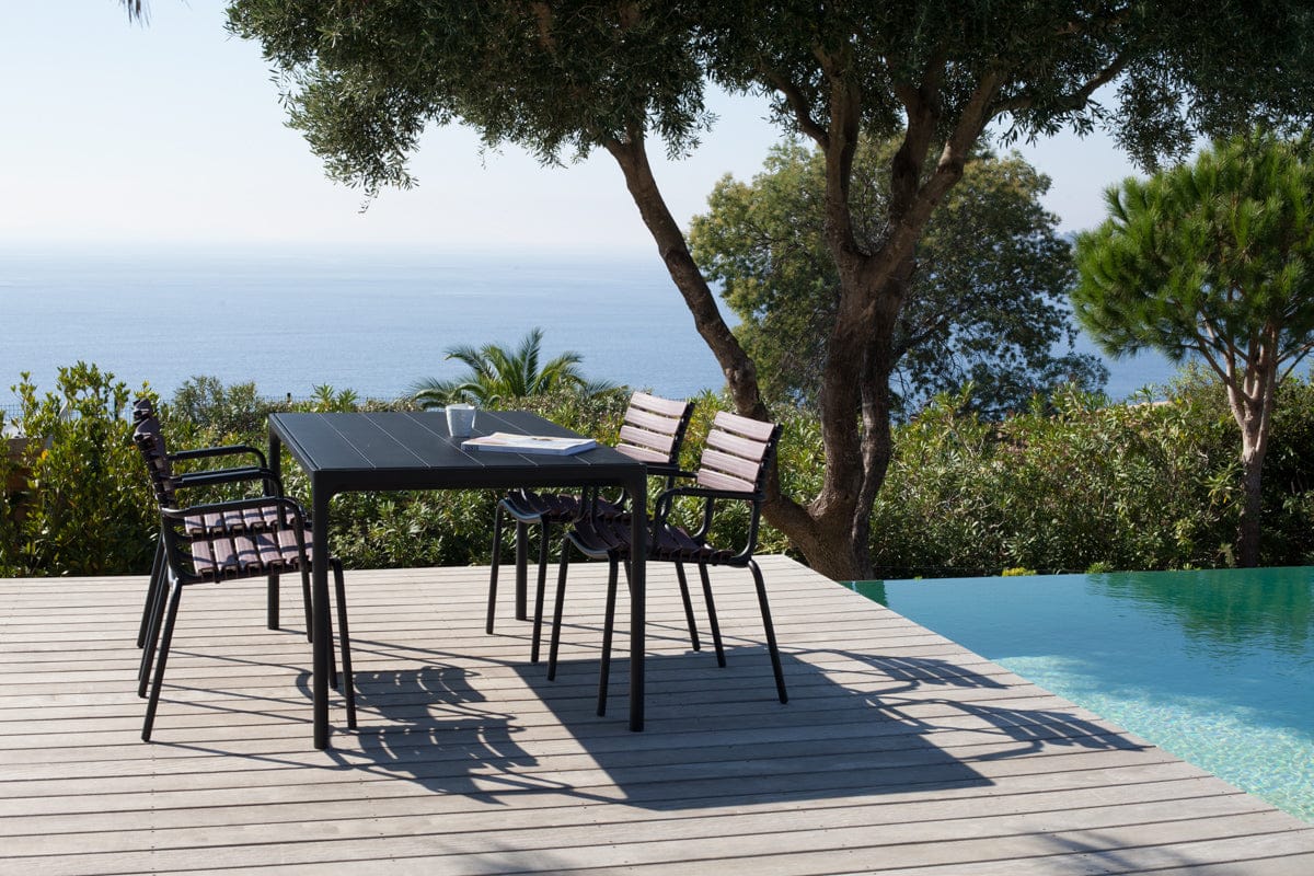 Black outdoor dining set with four chairs