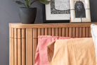 Wooden bed frame with art and shirts - DSC_2254