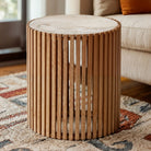 Wooden slat side table on rug