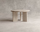 Wooden side table with round top