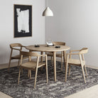 Round oak dining table set with armchairs