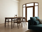 Grasshopper dining table and armchairs in modern room
