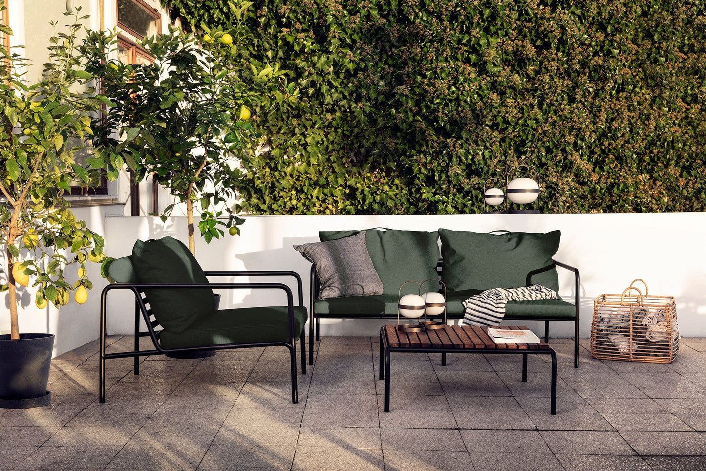 Alpine green outdoor furniture set on patio