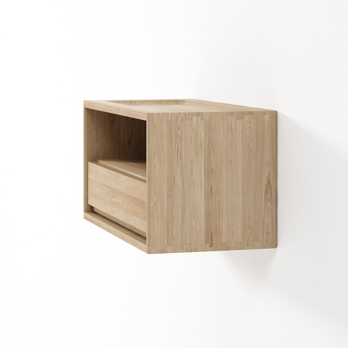 Wooden wall-mounted shelf with a drawer on a white background