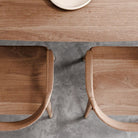 Overhead view of wooden table and chairs