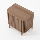 Wooden KKP04T_5 cabinet with vertical slat detailing.