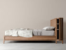 KKP11O Wooden bed frame with linen bedding
