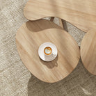 Coffee table with cappuccino on rug