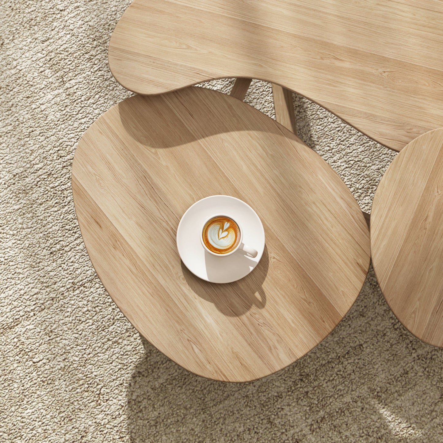 Coffee table with cappuccino on rug