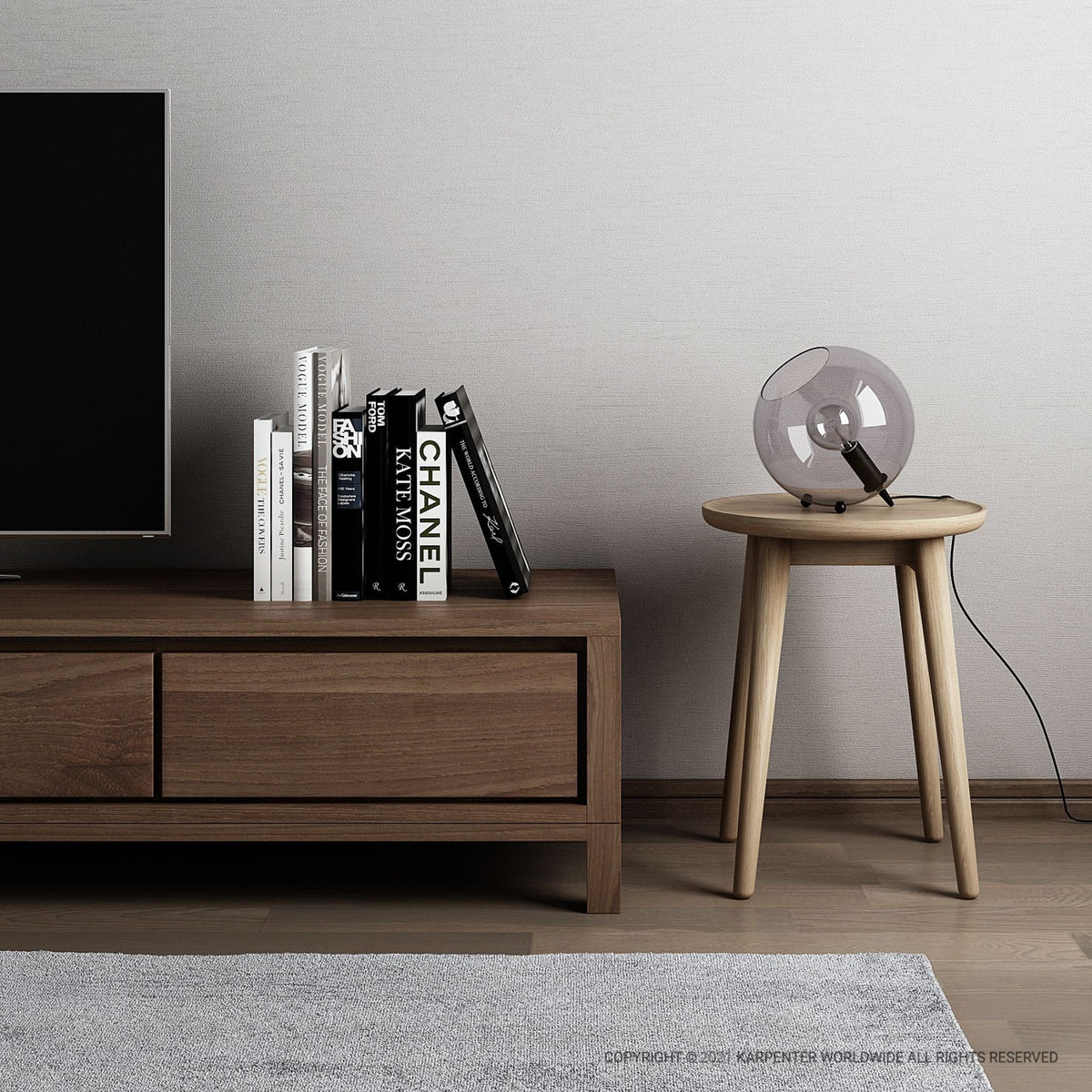 Modern lamp & books on wooden side table