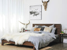 KSD011O_1 bedroom with modern décor and animal skulls