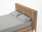 Koppar Oak Bed with Gray Bedding