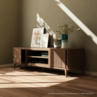 Koppar Media Cabinet with artwork and vase