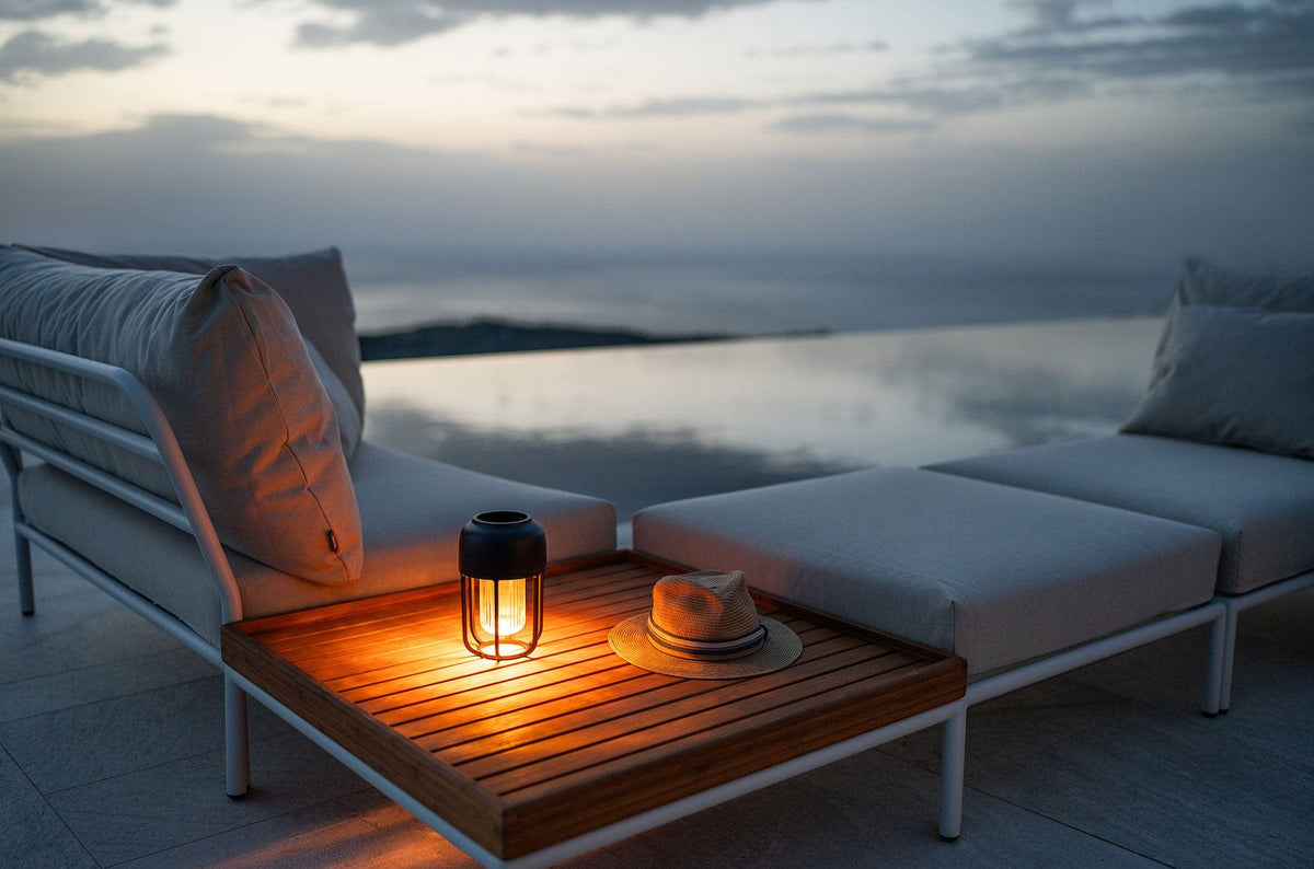 Black lantern on patio table with LEVEL2 set