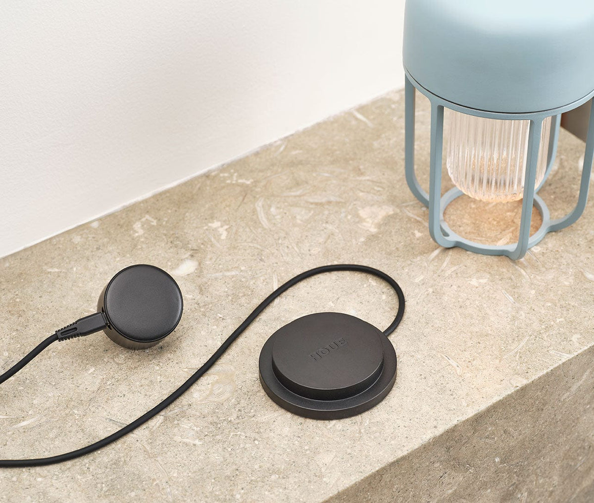 HOUE Ice Blue charger with lamp on countertop