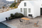 Outdoor furniture set in front of white building - MG_1589