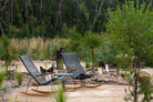 Outdoor rocking lounge chairs in natural setting