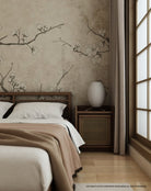 Roots side table in bedroom with floral wall art