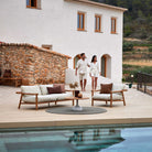 STICKS 2 Seater Sofa with couple by pool