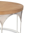 Round wood top coffee table with white metal base