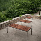 Outdoor wooden tables on patio