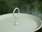 Pistachio eyelet tray with handle.