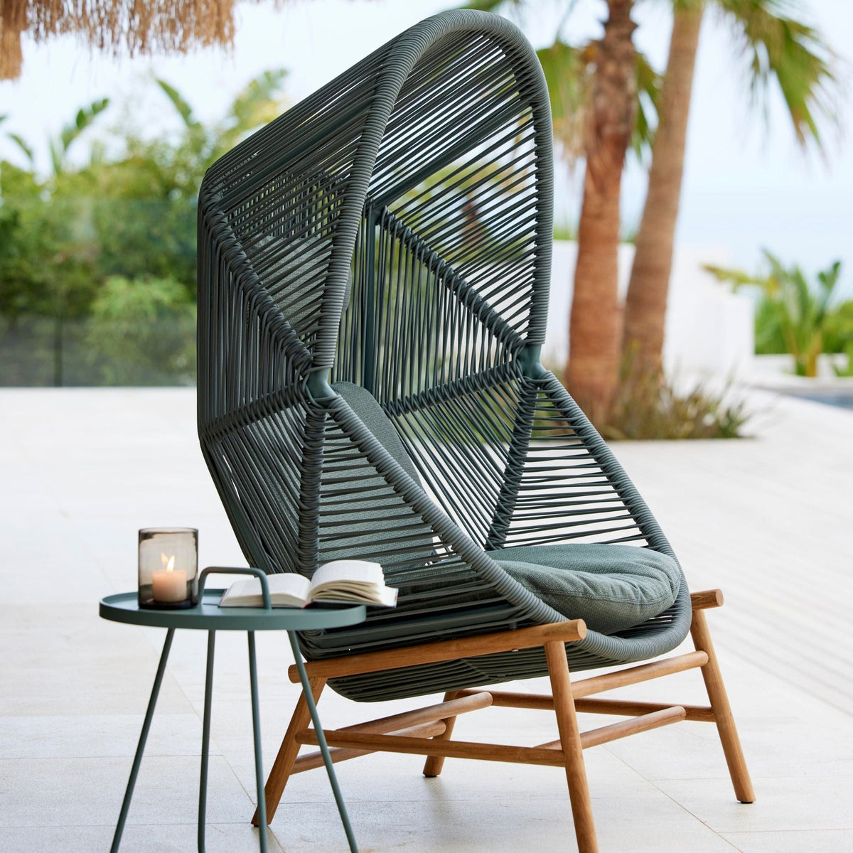 Green teak Hive chair with cushions