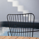 Paon Bar Chair with Cushion, back view by pool