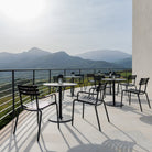 Pico Alua Black outdoor furniture with mountain view.