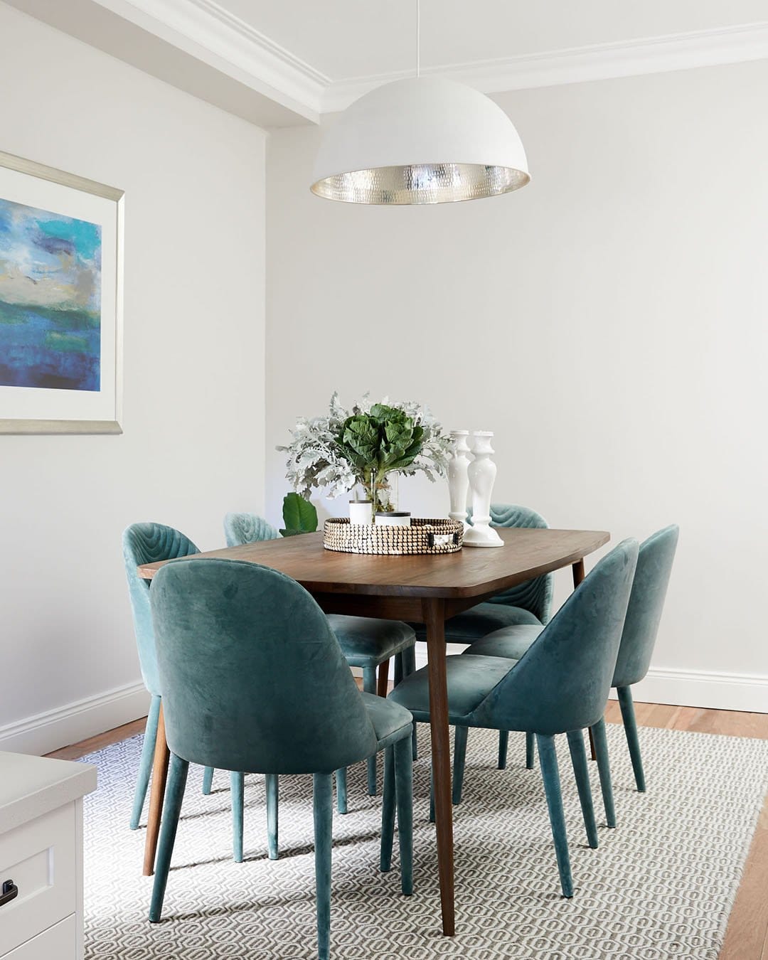 Smart spaces dining room with teal chairs
