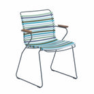 Multicolor striped dining chair with wood armrests.