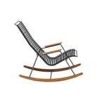 Modern rocking chair with black seat and wooden arms.